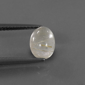 1.40カラットの天然無色＆ゴールドルチルクォーツ（8.3×6.1 mm・透明）