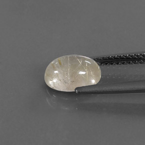 1.40カラットの天然無色＆ゴールドルチルクォーツ（8.3×6.1 mm・透明）