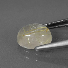 1.49カラットの天然無色＆ゴールドルチルクォーツ（7.9×6.1 mm・透明）