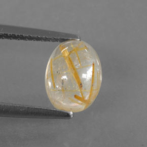 1.48カラットの天然無色＆ゴールドルチルクォーツ（7.9×6.2 mm・透明）