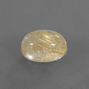 1.63カラットの天然無色＆ゴールドルチルクォーツ（8.2×6.1 mm・透明）