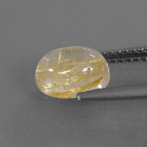 1.63カラットの天然無色＆ゴールドルチルクォーツ（8.2×6.1 mm・透明）