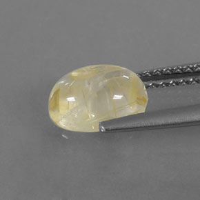 1.52カラットの天然無色＆ゴールドルチルクォーツ（8.1×6.2 mm・透明）