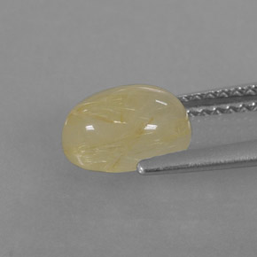 1.57カラットの天然無色＆ゴールドルチルクォーツ（8.2×6.1 mm・透明）