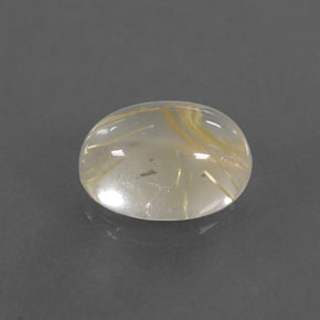 1.79カラットの天然無色＆ゴールドルチルクォーツ（8.6×6.4 mm・オーバルカット）