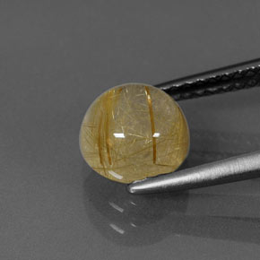 1.71カラットの天然無色＆ゴールドルチルクォーツ（7.09 mm・透明）