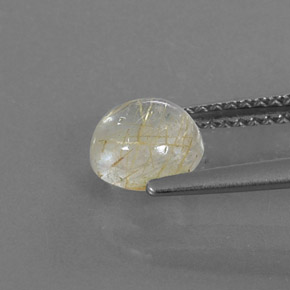 1.19カラットの天然無色＆ゴールドルチルクォーツ（6.53 mm・ラウンドカット）