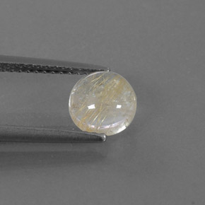 1.27カラットの天然無色＆ゴールドルチルクォーツ（6.95 mm・ラウンドカット）