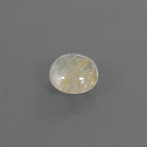 1.27カラットの天然無色＆ゴールドルチルクォーツ（6.95 mm・ラウンドカット）