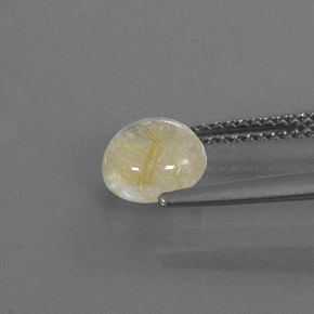 1.32カラットの天然無色＆ゴールドルチルクォーツ（6.96 mm・ラウンドカット）