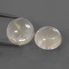 カラットの天然無色＆ゴールドルチルクォーツ（8.03 mm・ラウンドカット）