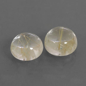カラットの天然無色＆ゴールドルチルクォーツ（8.03 mm・ラウンドカット）