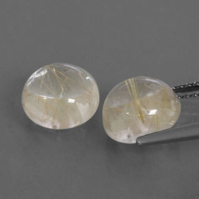 カラットの天然無色＆ゴールドルチルクォーツ（8.03 mm・ラウンドカット）