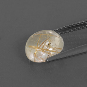 1.78カラットの天然無色＆ゴールドルチルクォーツ（8.02 mm・ラウンドカット）