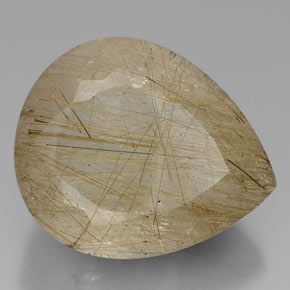 60.42カラットの天然無色＆ゴールドルチルクォーツ（28.5×23.5 mm・洋梨の形）