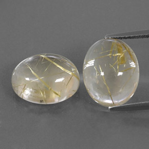 カラットの天然無色＆ゴールドルチルクォーツ（12.2×10 mm・オーバルカット）