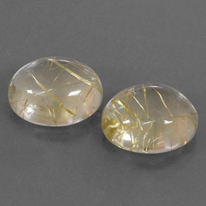 カラットの天然無色＆ゴールドルチルクォーツ（12.2×10 mm・オーバルカット）