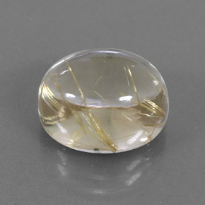 7.12カラットの天然無色＆ゴールドルチルクォーツ（12.3×10 mm・オーバルカット）