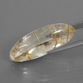 10.87カラットの天然無色＆ゴールドルチルクォーツ（23.3×8.8 mm・マーキス）
