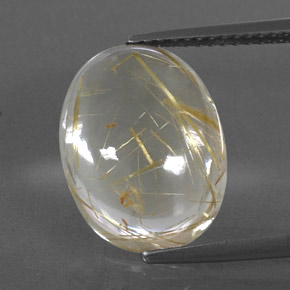 7.87カラットの天然無色＆ゴールドルチルクォーツ（14.8×11.3 mm・オーバルカット）