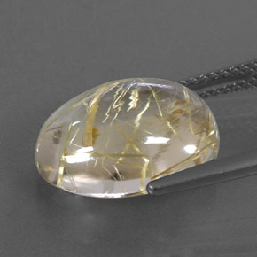 7.87カラットの天然無色＆ゴールドルチルクォーツ（14.8×11.3 mm・オーバルカット）