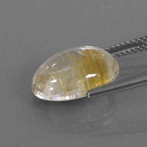 5.68カラットの天然無色＆ゴールドルチルクォーツ（13.8×10 mm・オーバルカット）
