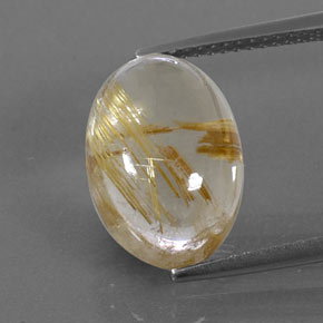 7.07カラットの天然無色＆ゴールドルチルクォーツ（13.9×10 mm・オーバルカット）