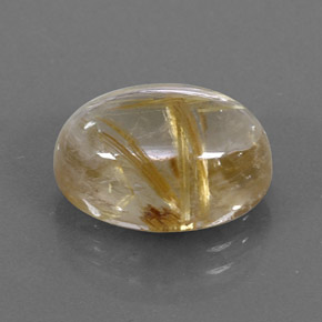 7.07カラットの天然無色＆ゴールドルチルクォーツ（13.9×10 mm・オーバルカット）