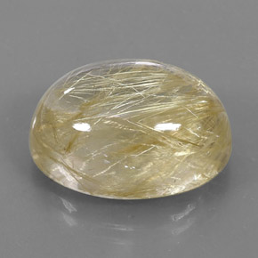 22.76カラットの天然無色＆ゴールドルチルクォーツ（19.9×15.1 mm・オーバルカット）