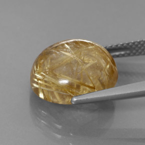 8.08カラットの天然無色＆ゴールドルチルクォーツ（12.87 mm・透明）