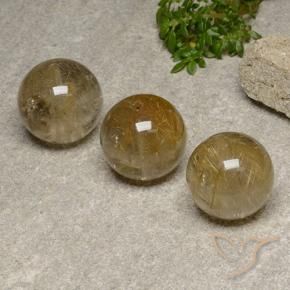 Shop natural 55.78ct 非常に薄いゴールデンブラウン ルチルクォーツ gems, スフェア / ボール, from インド at GemSelect. In stock, global shipping!