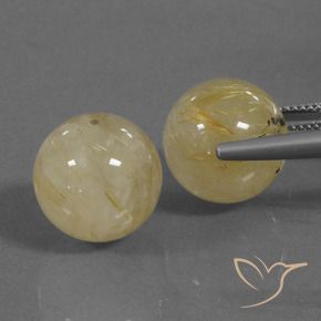 Shop natural 35.25ct ミディアムイエロー ルチルクォーツ gems, スフェア / ボール, from インド at GemSelect. In stock, global shipping!