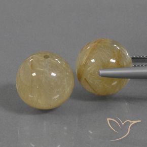 Shop natural 33.97ct アーシーイエロー ルチルクォーツ gems, スフェア / ボール, from インド at GemSelect. In stock, global shipping!