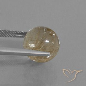 10.50カラットの天然非常に薄いゴールデンブラウンルチルクォーツ、スフェア / ボール、透明