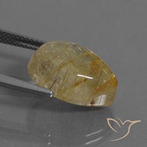 11.11カラットの天然非常に薄いゴールデンブラウンルチルクォーツ、洋梨の形、透明