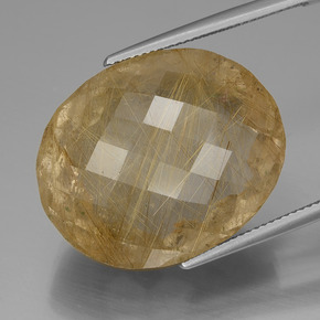 50.97カラットの天然非常に薄いゴールデンブラウンルチルクォーツ（25.8×21 mm・オーバルカット）