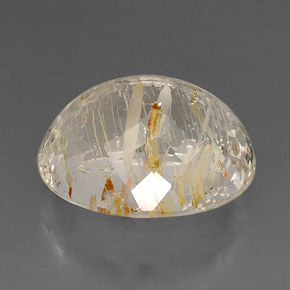 24.30カラットの天然ゴールデンルチルトパーズ（18.4×14.9 mm・透明）