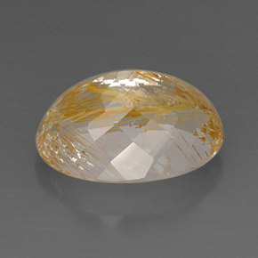 22.60カラットの天然ゴールデンルチルトパーズ（19.3×13.9 mm・透明）