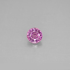 0.56カラットの天然ピンクがかった紫サファイア（4.79 mm・ラウンドカット）
