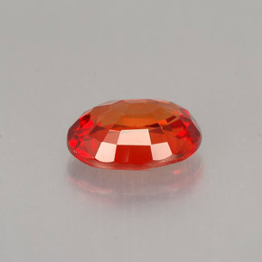 0.99カラットの天然赤みがかったオレンジサファイア（6.8×5.1 mm・オーバルカット）