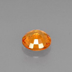 0.60カラットの天然イエローオレンジサファイア（5.18 mm・ラウンドカット）