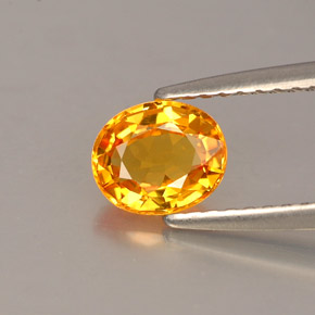 0.87カラットの天然イエローオレンジサファイア（6.2×5.2 mm・オーバルカット）