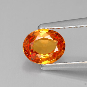 0.79カラットの天然マンダリンオレンジサファイア（6.1×5 mm・オーバルカット）