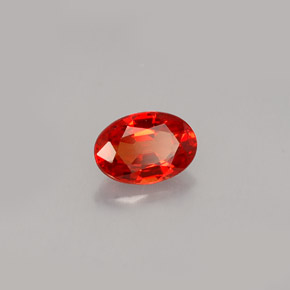 0.61カラットの天然マンダリンオレンジサファイア（6.1×4.2 mm・オーバルカット）