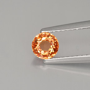0.57カラットの天然イエローオレンジサファイア（4.90 mm・ラウンドカット）