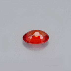 0.60カラットの天然赤みがかったオレンジサファイア（6×4.1 mm・オーバルカット）