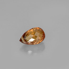 0.91カラットの天然イエローオレンジサファイア（6.3×4.1 mm・ブリオレット）