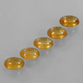 3.06カラットの天然濃いオレンジゴールドサファイア（5.8×4.1 mm・透明）