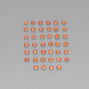 カラットの天然オレンジサファイア（1.79 mm・ラウンドカット）