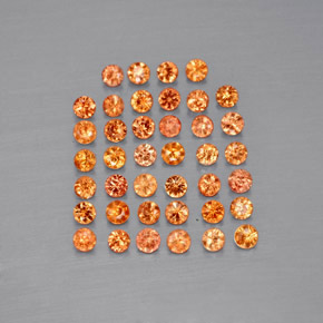 カラットの天然オレンジサファイア（1.81 mm・ラウンドカット）